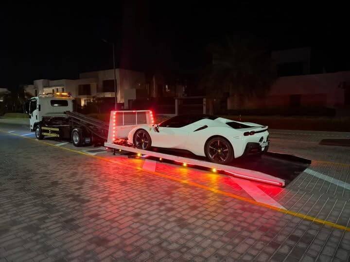 sports car towing by car recovery service